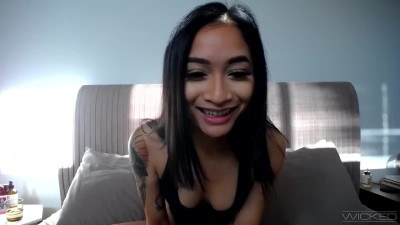 Awesome Asian girl with small tits spreads her legs and shows her pussy