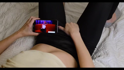 Solo slim babe masturbates in her pants to lesbian porn