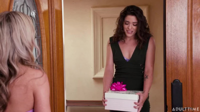 Brunette chick surprises her bestie with strap-on gift