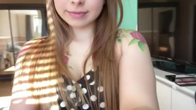 A cute blonde showed her shaved pussy.