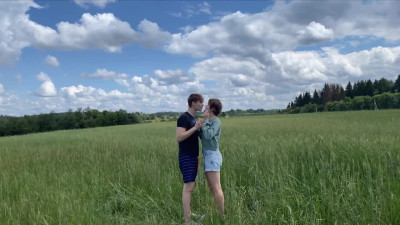 A couple in the beautiful steppe copulates in the open air.