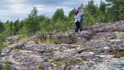 the couple engaged in sensual sex in nature.
