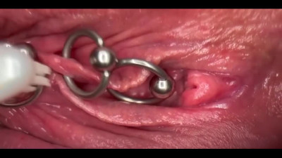 Pussy wet and creamy while hon bushes her piercing