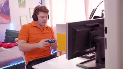 Big tits brunette gets naked to attract her gamer bf attention