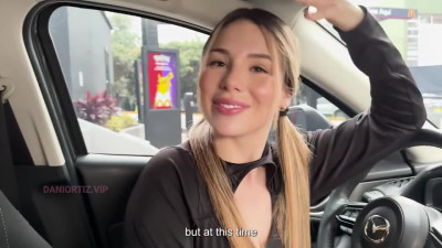 Playful busty blonde tries to drive a car with a vibrator in her pussy